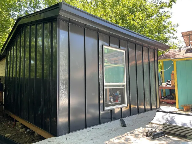 Black standing seam metal wall panels for Roof Inspection in Bradley