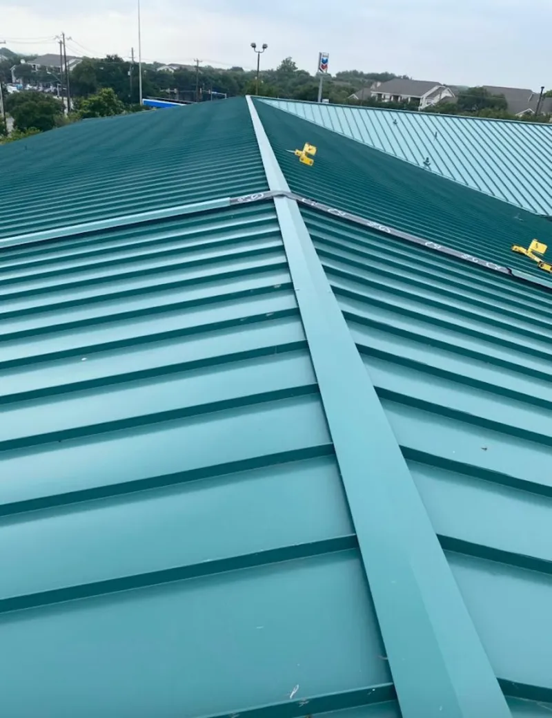 Green commercial metal roof ridge and valley for Metal Roof Repair in Bradley